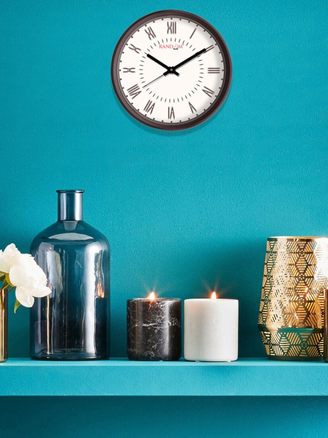 

RANDOM White Round Solid Analogue Wall Clock