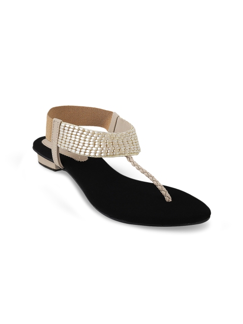 

Metro Women Beige Solid Synthetic T-Strap Flats