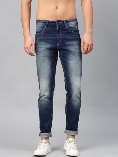 

HRX by Hrithik Roshan Men Blue Slim Fit Mid-Rise Clean Look Stretchable Jeans