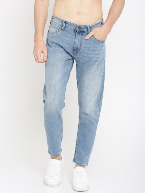 

Moda Rapido Men Blue Tapered Fit Cropped Mid-Rise Clean Look Stretchable Jeans
