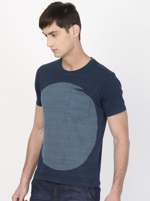 

ether Men Blue Solid Round Neck T-shirt