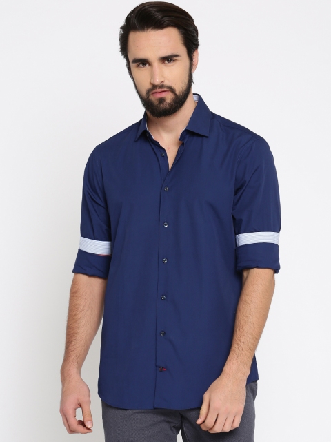 

Tommy Hilfiger Men Navy Blue Snug Slim Fit Solid Casual Shirt