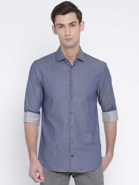 

Tommy Hilfiger Men Blue Snug Slim Fit Solid Casual Shirt
