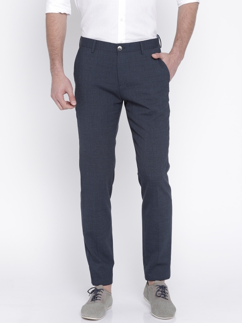 

Tommy Hilfiger Men Navy Blue Slim Fit Solid Regular Trousers