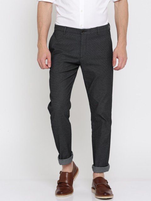 

Tommy Hilfiger Men Charcoal Grey Slim Fit Self-Fit Regular Trousers