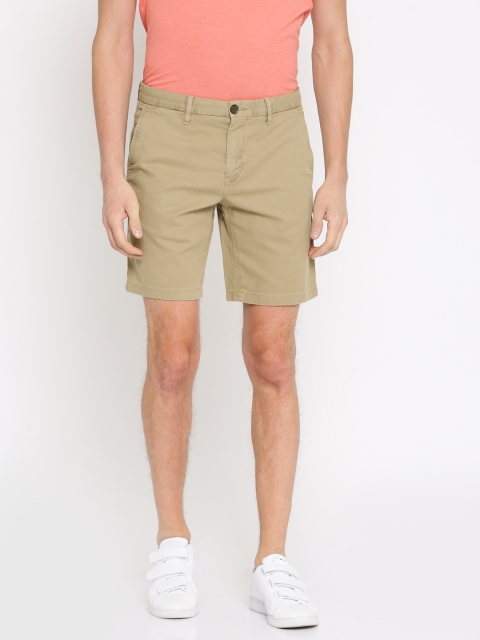 

Tommy Hilfiger Men Khaki Solid Slim Fit Regular Shorts