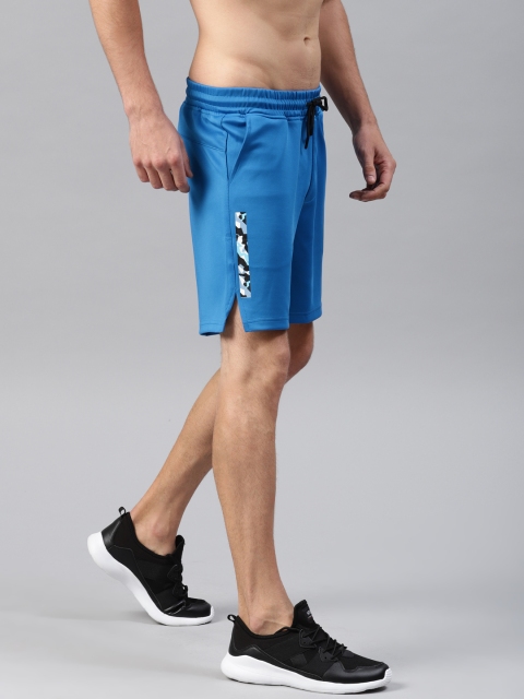 

HRX by Hrithik Roshan Men Blue Solid Sports Shorts