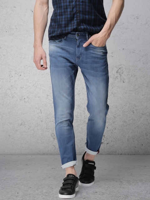 

Ecko Unltd Men Blue Tapered Fit Mid-Rise Clean Look Stretchable Jeans