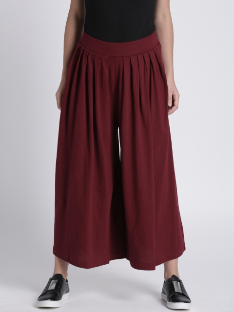 

Splash Women Burgundy Solid Flared Palazzos