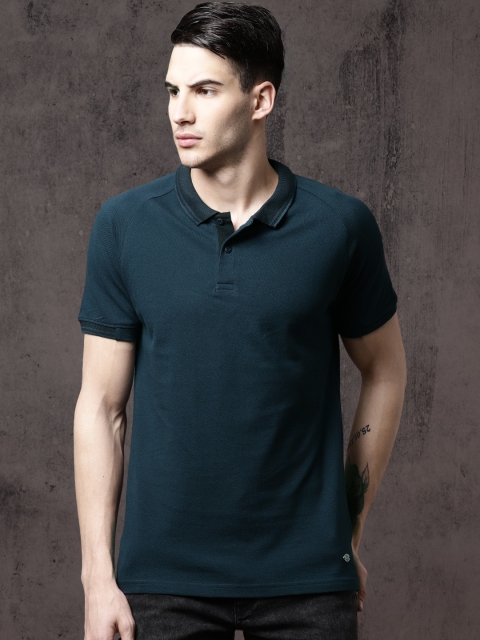 

Roadster Men Navy Blue Solid Polo Collar T-shirt