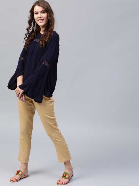 

SASSAFRAS Women Beige Pencil Fit Solid Trousers