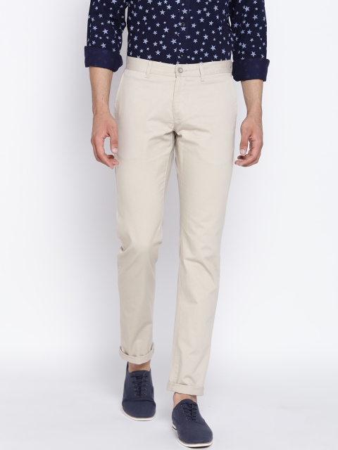 

Blackberrys Men Beige Sharp Tapered Fit Solid Casual Trousers