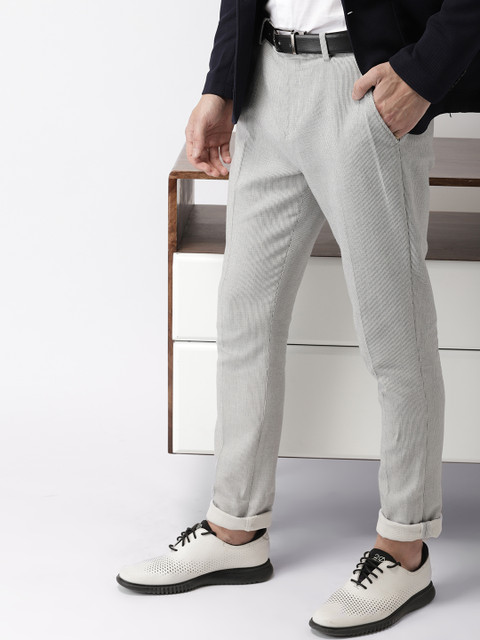 

INVICTUS Men White & Black Self-Design Regular Trousers