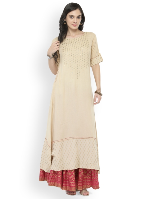 

Varanga Women Off-White Solid Kurta with Skirt