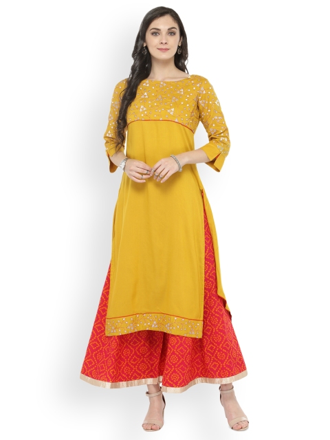 

Varanga Yellow Embroidered Kurta With Pink Printed Palazzo