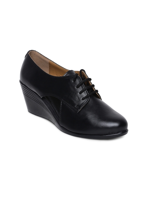 

Marc Loire Women Black Solid Heeled Boots
