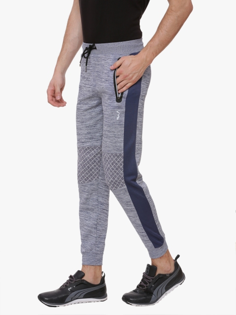 

Campus Sutra Men's Blue Self-Design Jogger Trousers