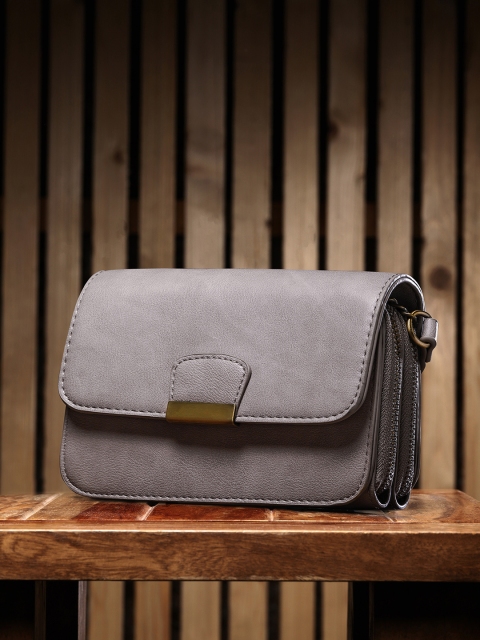 

Roadster Beige Solid Sling Bag