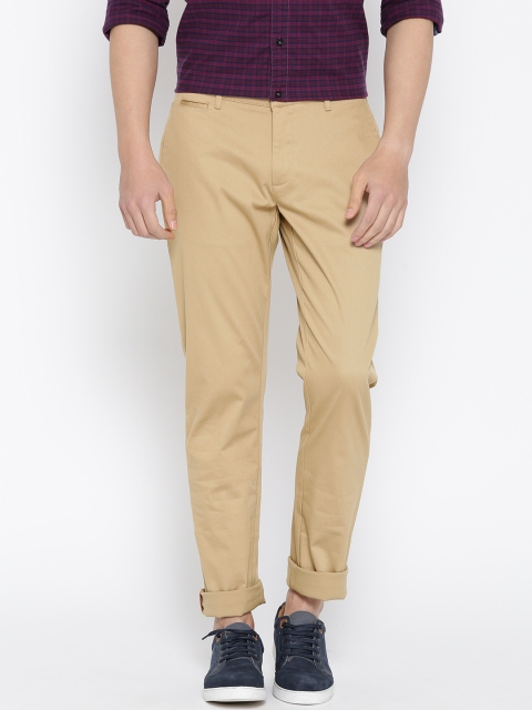 

Blackberrys Men Beige Sharp Fit Solid Trousers