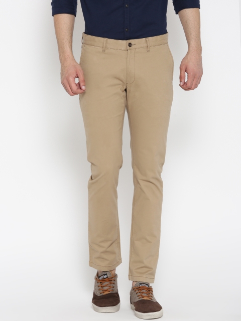 

Blackberrys Men Beige Sharp Fit Solid Casual Trousers