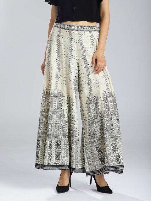 

W Women Off-White & Black Flared Printed Palazzos
