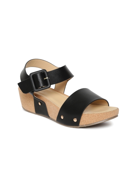 

Van Heusen Women Black Solid Sandals