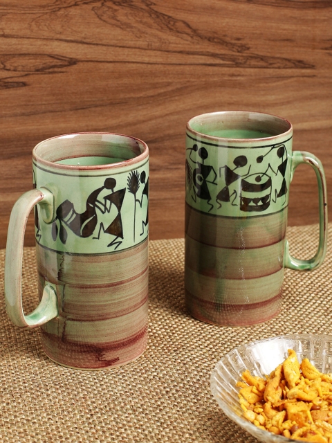 

ExclusiveLane 'Two To Tango' Warli Hand-Painted Beer & Milk Mugs In Ceramic (Set Of 2), Green