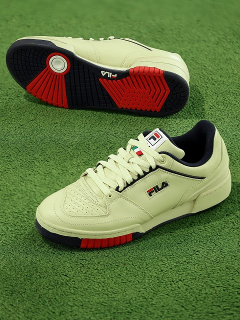 

FILA Men Cream-Coloured Solid Synthetic Leather Mid-Top Sneakers