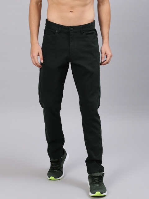 

HRX by Hrithik Roshan Men Navy Blue Slim Fit Solid Regular Trousers