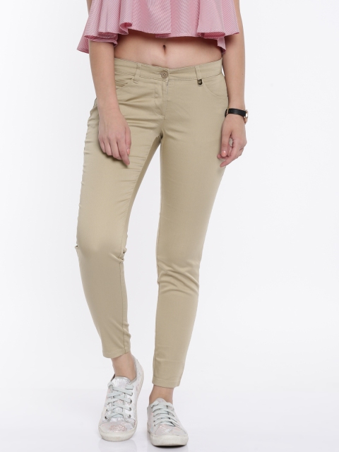 

Park Avenue Women Beige Tapered Fit Solid Formal Trousers