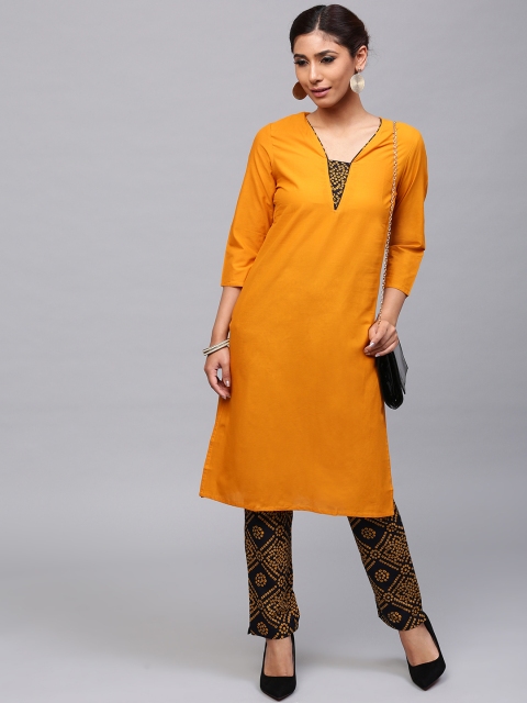 

AKS Women Mustard Yellow & Black Solid Kurta with Trousers