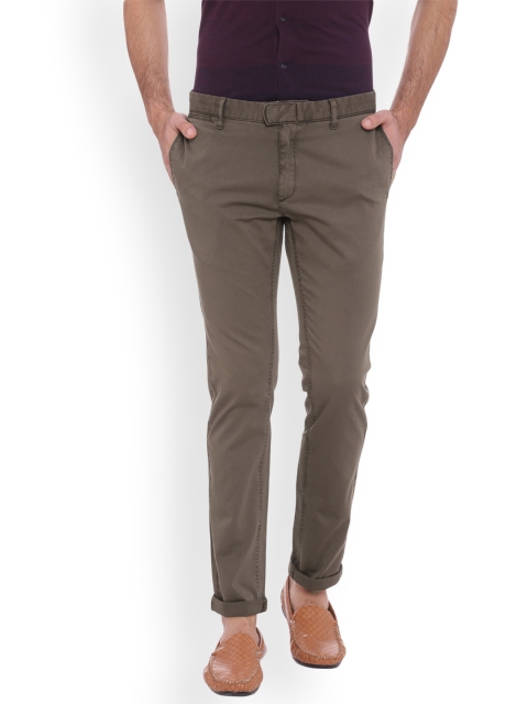 

Basics Men Brown Tapered Fit Self Design Chinos