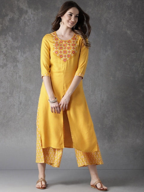 

Anouk Women Yellow Self Design Kurta with Palazzos