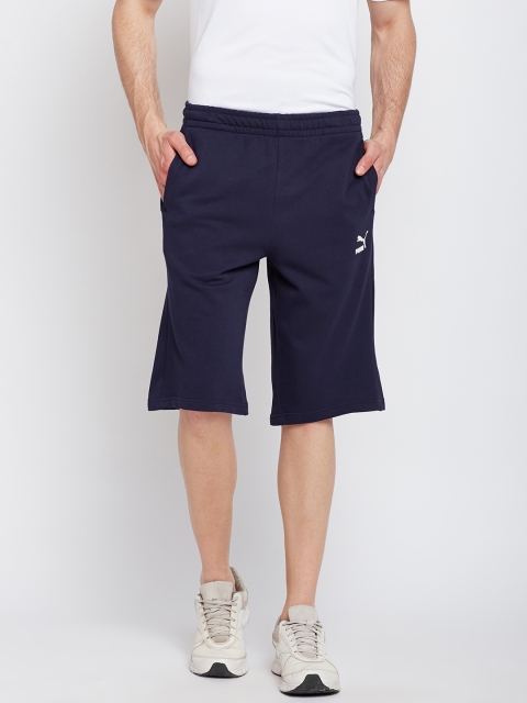 

Puma Men Navy Blue Solid Regular Fit Regular Shorts