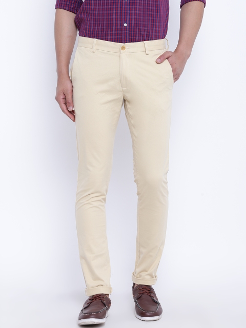 

Blackberrys Men Beige Solid Trousers