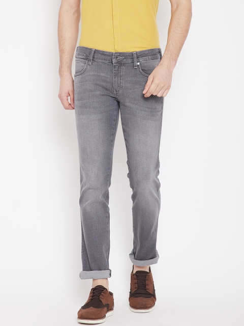 

Wrangler Men Blue Tapered Fit Low-Rise Clean Look Jeans