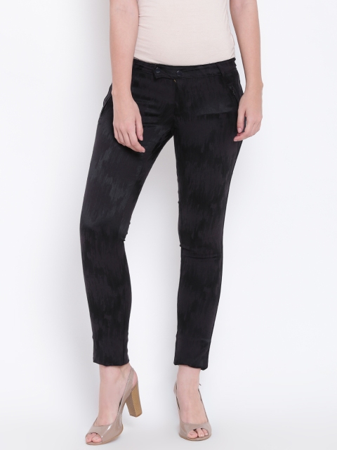 

Madame Women Black Self-Design Trousers