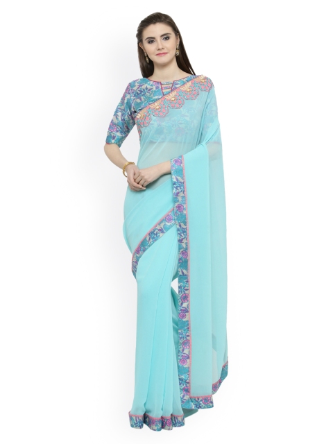 

Shaily Turquoise Blue Printed Pure Georgette Saree