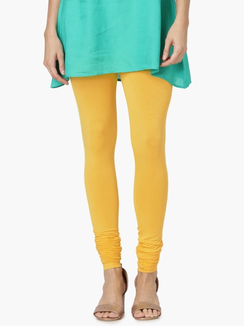 

Melange by Lifestyle Women Yellow Solid Churidar-Length Leggings