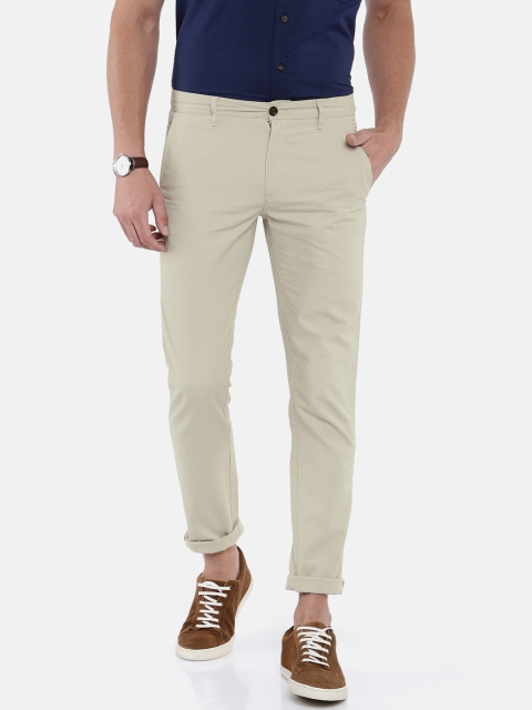

Arrow Sport Men Beige Slim Fit Solid Regular Trousers
