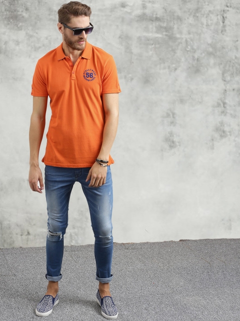 

Breakbounce Men Orange Solid Polo Collar T-shirt