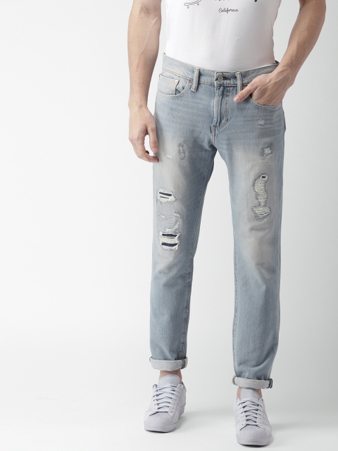 

Levis Men Blue Slim Fit 501 Mid-Rise Mildly Distressed Stretchable Jeans