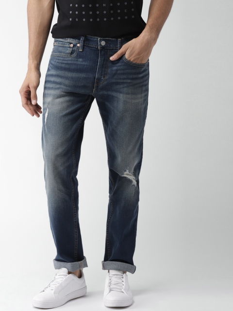 

Levis Men Blue Slim Fit Low-Rise Mildly Distressed Stretchable Jeans 511