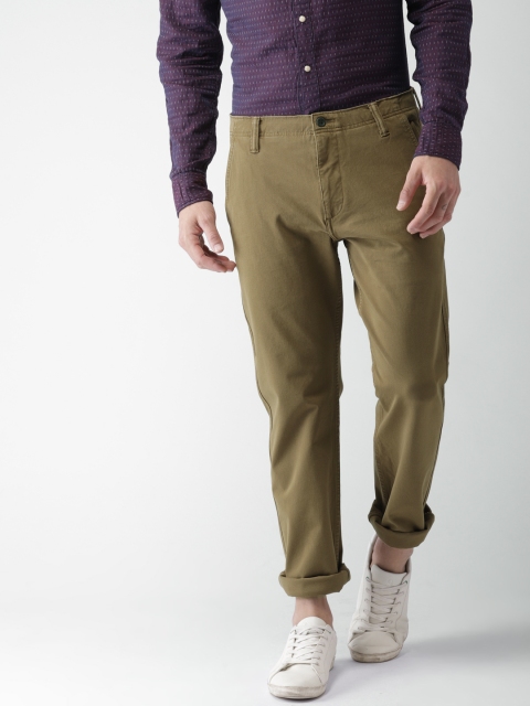 

Levis Men Brown Tapered Fit Solid Chinos