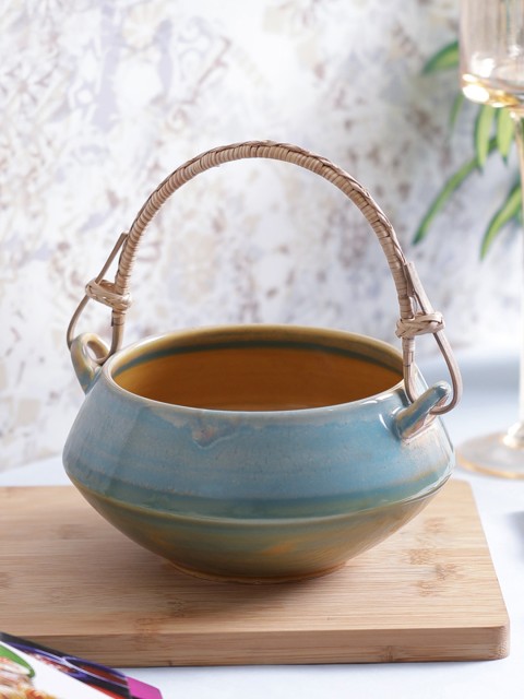 

VarEesha Blue Solid Ceramic Bowl with Cane Handle