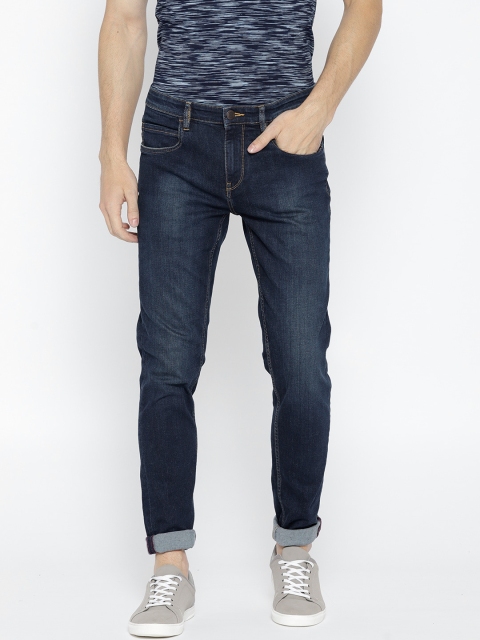 

Arrow Blue Jean Co. Men Blue Tapered Fit Mid-Rise Clean Look Jeans