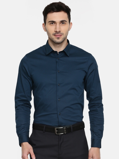 

Arrow New York Men Navy Snug Slim Fit Solid Formal Shirt, Navy blue