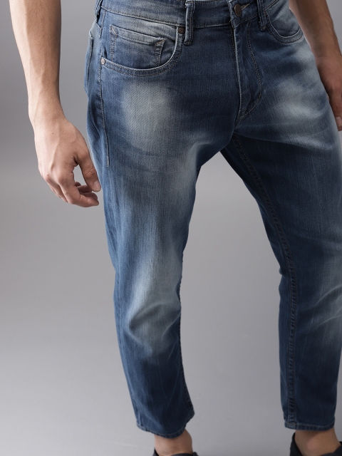 

HERE&NOW Men Blue Cropped Tapered Fit Mid-Rise Clean Look Stretchable Jeans