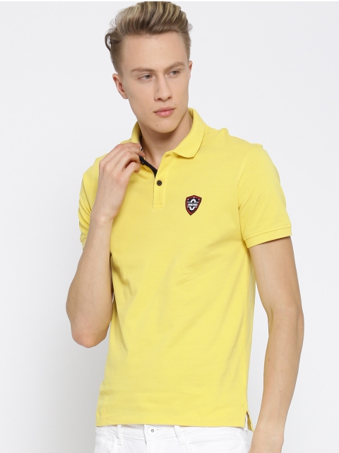 

Peter England Casuals Men Yellow Solid Polo Collar T-shirt