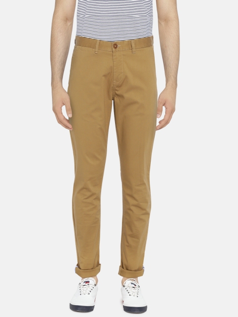 

Van Heusen Sport Men Brown Tapered Fit Self Design Regular Trousers